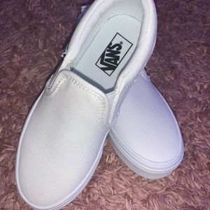 Brand new never worn kids Vans slip ons. No tags